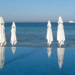 Umbrellas At Infinity Pool